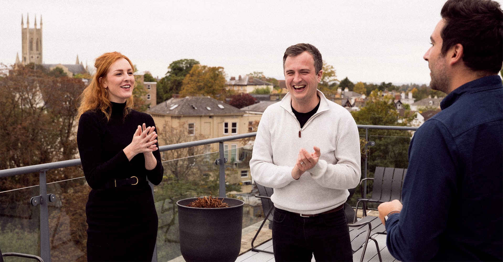 Photo of a study hall with wooden tables and chairs.